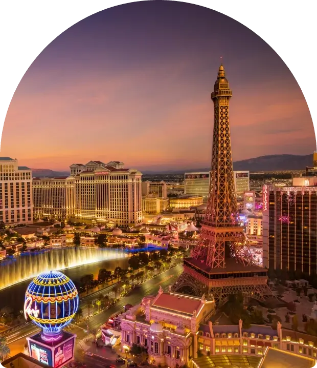 Evening view of the Las Vegas Strip with the Eiffel Tower replica.